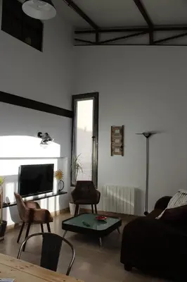 Télévision ou salle de divertissement dans l'établissement Ma Maison
