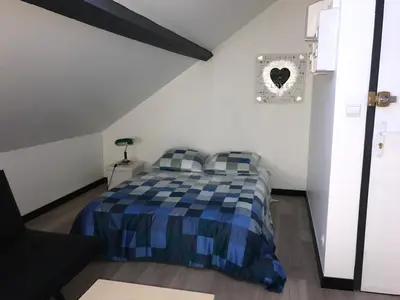Un ou plusieurs lits dans un hébergement de l'établissement Luxury Suite Lilas 4