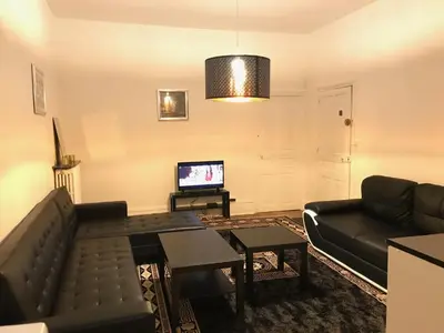 Télévision ou salle de divertissement dans l'établissement Luxury Suite Lilas 1