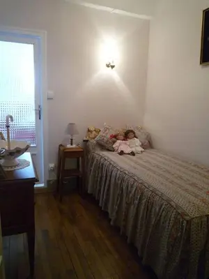 Un ou plusieurs lits dans un hébergement de l'établissement TOURNUS Belle maison vue sur Saône
