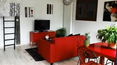 Télévision ou salle de divertissement dans l'établissement Le vieux Pressoir