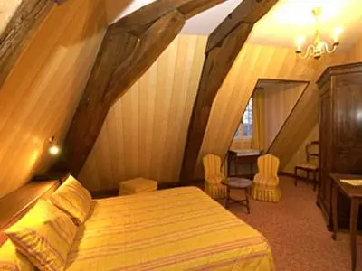 Un ou plusieurs lits dans un hébergement de l'établissement Château de Rigny