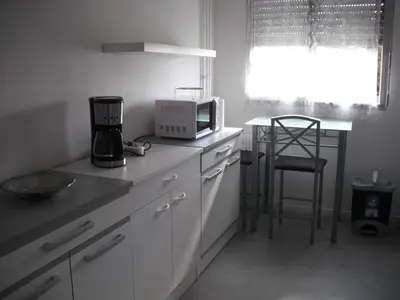Cuisine ou kitchenette dans l'établissement Residence Le Vendome