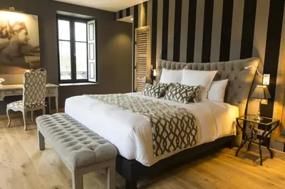 Un ou plusieurs lits dans un hébergement de l'établissement Domaine de Rymska & Spa - Relais & Châteaux
