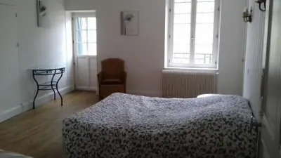 Un ou plusieurs lits dans un hébergement de l'établissement Gite Au Coeur De Volnay