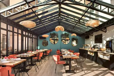 Restaurant ou autre lieu de restauration dans l'établissement Appartements des Ducs