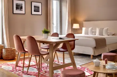 Coin salon dans l'établissement Appartements des Ducs