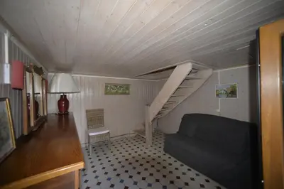 Coin salon dans l'établissement Le Moulin Rénové