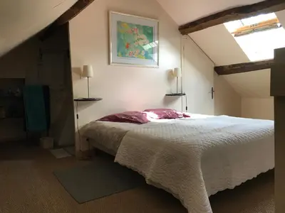 Un ou plusieurs lits dans un hébergement de l'établissement Maison Bleue