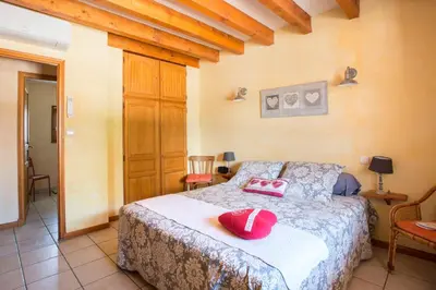 Un ou plusieurs lits dans un hébergement de l'établissement La Maison du Bonheur