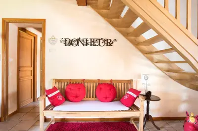 Coin salon dans l'établissement La Maison du Bonheur