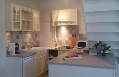 Cuisine ou kitchenette dans l'établissement Le Cèdre enchanté
