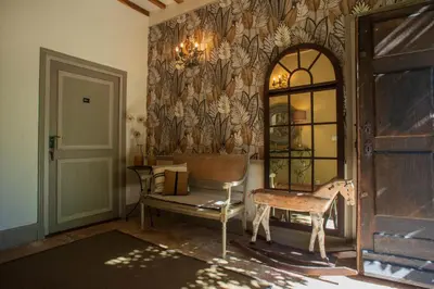 Coin salon dans l'établissement Maison le Village - Maison d’Hôtes