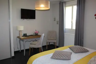 Un ou plusieurs lits dans un hébergement de l'établissement Le Clos de la Challangette