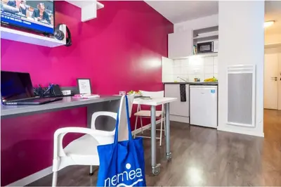 Cuisine ou kitchenette dans l'établissement Résidence Nemea Dijon Eiffel