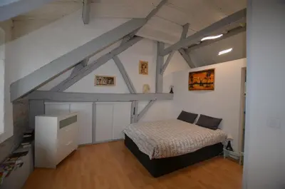 Un ou plusieurs lits dans un hébergement de l'établissement Les chambres de Marie'O