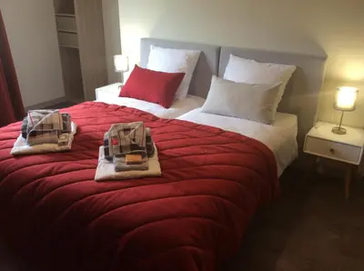 Un ou plusieurs lits dans un hébergement de l'établissement domaine la fontaine du mont