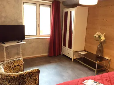 Télévision ou salle de divertissement dans l'établissement domaine la fontaine du mont