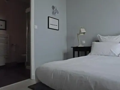 Un ou plusieurs lits dans un hébergement de l'établissement Hôtel Courtille de Solutré