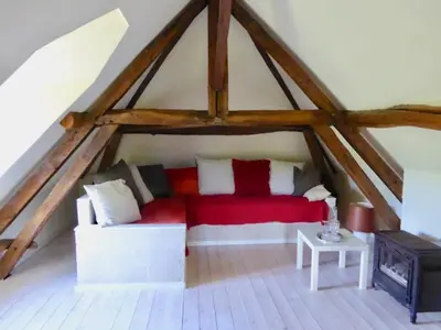Coin salon dans l'établissement Chambres d'Hotes à La Chandelle