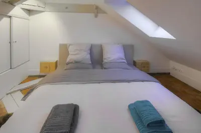 Un ou plusieurs lits dans un hébergement de l'établissement Academy's Loft