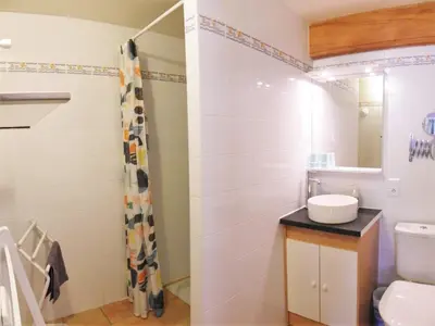 Salle de bains dans l'établissement Le Cottage du Château