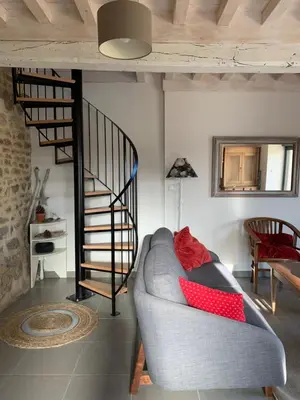 Coin salon dans l'établissement Gîte de la Pisserotte