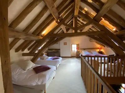 Un ou plusieurs lits dans un hébergement de l'établissement Le Hameau de Barboron