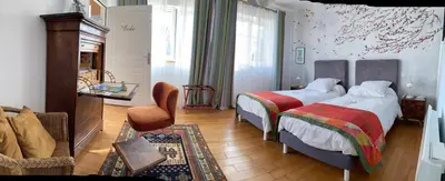 Un ou plusieurs lits dans un hébergement de l'établissement Chambres d'hôtes Le Relais de la Perle