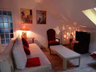 Un ou plusieurs lits dans un hébergement de l'établissement appartement dans maison, calme assuré