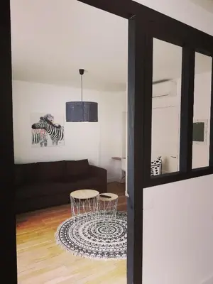 Télévision ou salle de divertissement dans l'établissement Suite 24 Appart'hôtel-3 étoiles