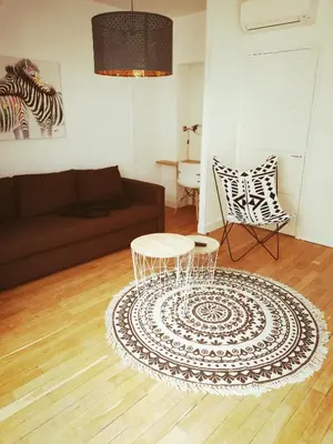 Coin salon dans l'établissement Suite 24 Appart'hôtel-3 étoiles