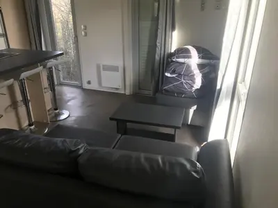 Coin salon dans l'établissement Les Lodges
