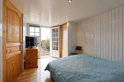Télévision ou salle de divertissement dans l'établissement Chambres d'hotes à Autun