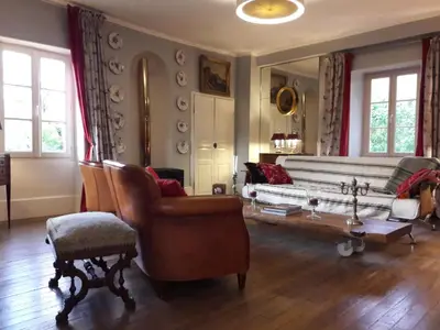 Coin salon dans l'établissement Maison d'hôtes des Perrières