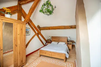 Un ou plusieurs lits dans un hébergement de l'établissement Chateau de la Grange