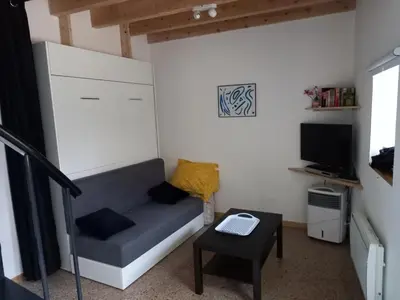 Télévision ou salle de divertissement dans l'établissement Relais de la truffière