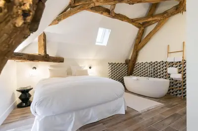 Un ou plusieurs lits dans un hébergement de l'établissement La Maison Deveney-Mars