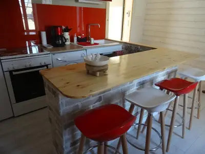 Cuisine ou kitchenette dans l'établissement LA BELLE D'ANTAN