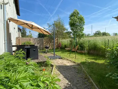 Jardin de l'établissement La petite marmite du lac de Vouglans