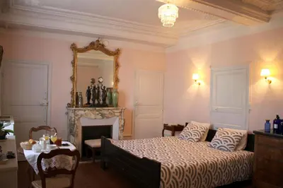 Un ou plusieurs lits dans un hébergement de l'établissement Chambres d'hôtes La Distillerie B&B
