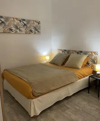 Un ou plusieurs lits dans un hébergement de l'établissement Chambres d'hôtes La Distillerie B&B