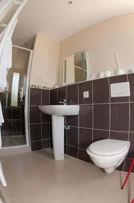 Salle de bains dans l'établissement Le Jardin de la Reyssouze