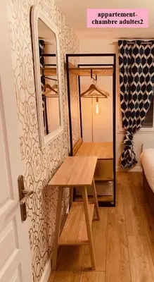 Un ou plusieurs lits dans un hébergement de l'établissement Hôtel Le Clos Badan