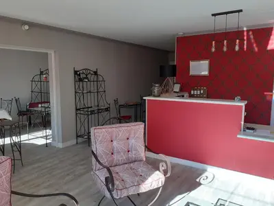 Coin salon dans l'établissement Hôtel de la Poste