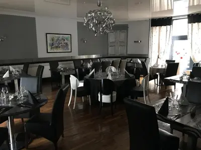 Coin salon dans l'établissement Hotel du Centre