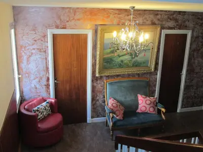 Coin salon dans l'établissement Hotel Victor Hugo
