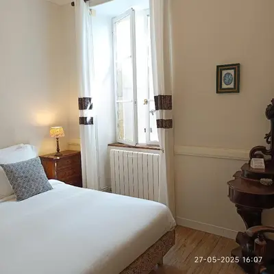 Un ou plusieurs lits dans un hébergement de l'établissement Gîte Donjon