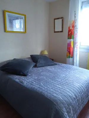 Un ou plusieurs lits dans un hébergement de l'établissement Chambre d'hôtes dans Résidence