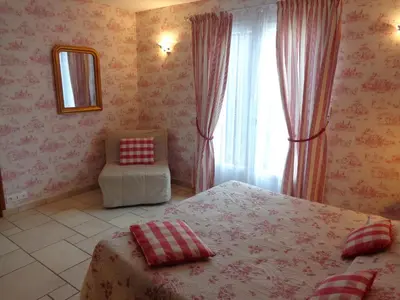 Un ou plusieurs lits dans un hébergement de l'établissement B&B Les Cistelles